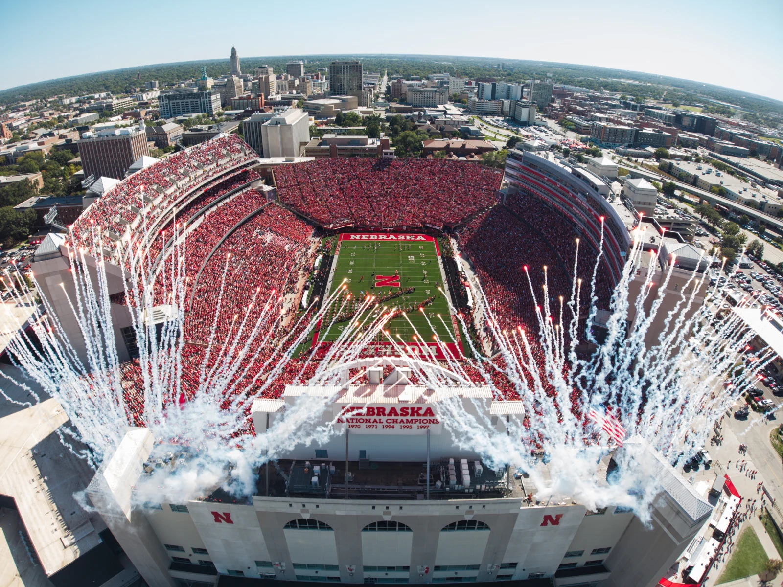 Fireworks go off over a sold-out Memorial Stadium as Nebraska runs onto the field before its homecoming game against Maryland in Lincoln, Neb., Saturday, Oct. 3, 2026. Nebraska won 48-23 to improve to 5-0.